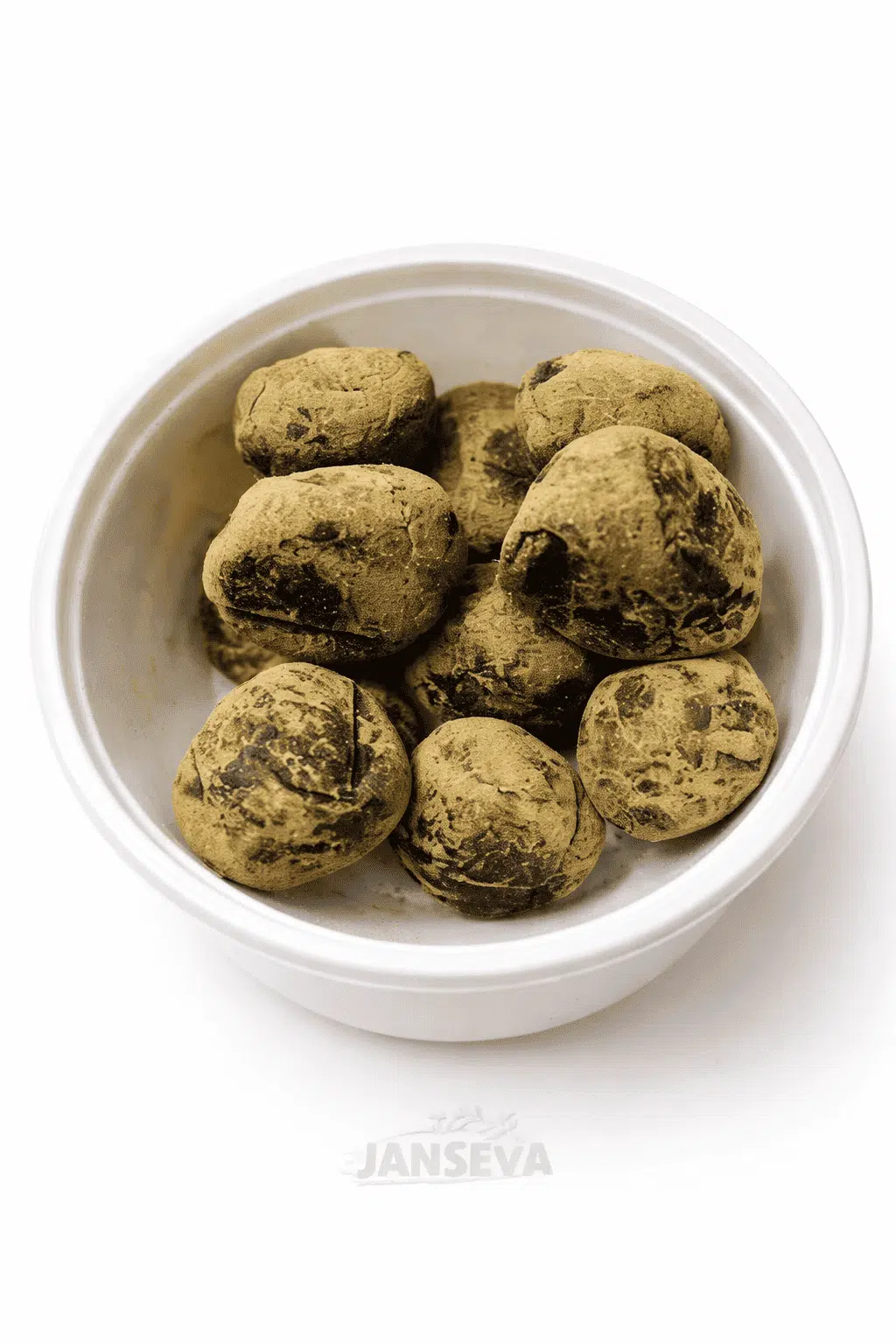 Bhang Goli herbal edibles in a white bowl, pack of 15 pieces for wellness.